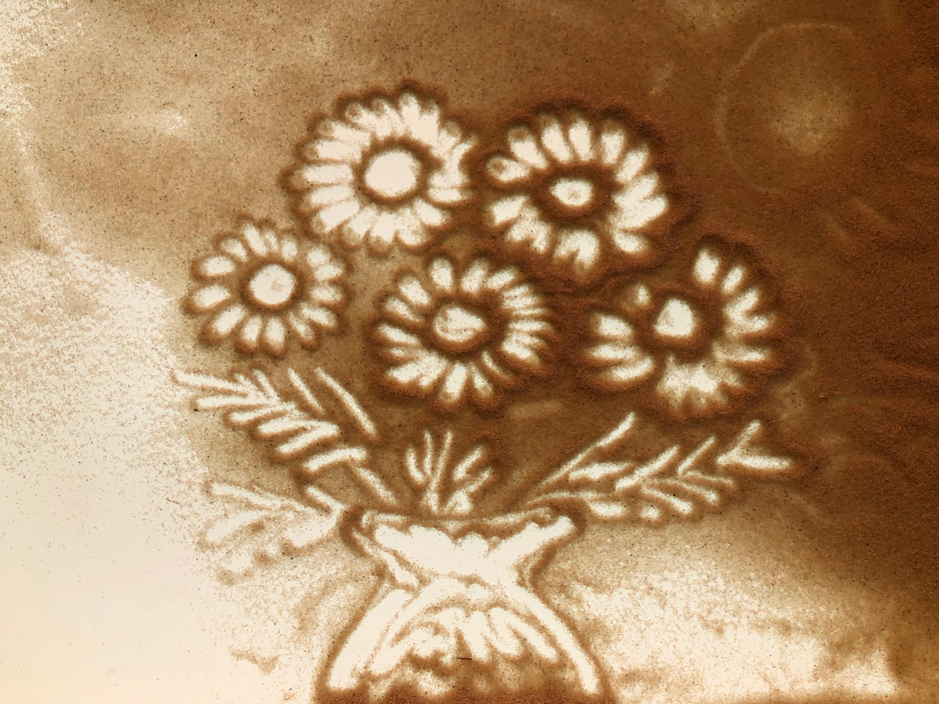 Рисование песком цветы